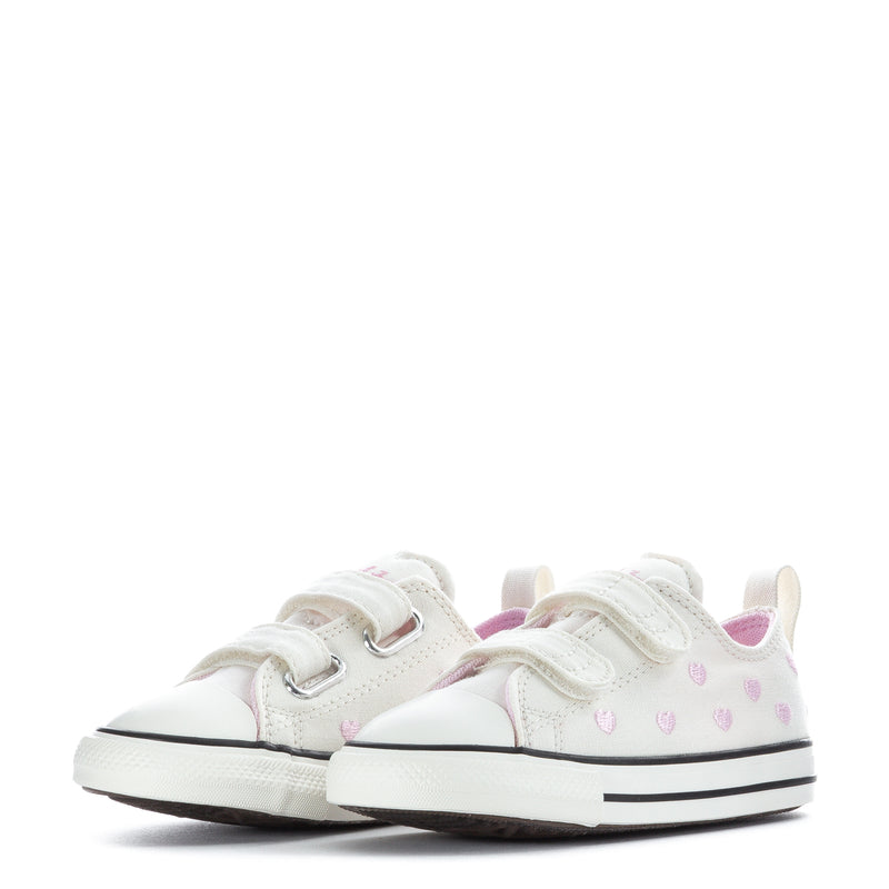 Toddler low-top sneakers pair, white with pink heart print, Velcro straps, black sole