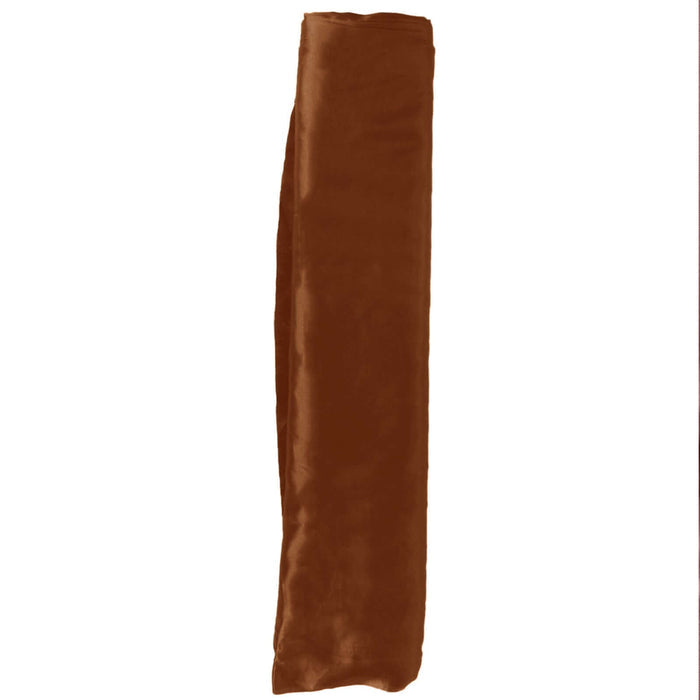 Brown velvet fabric roll on a white background.