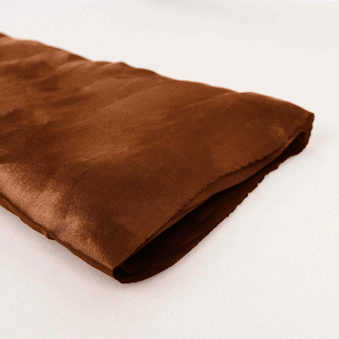 Brown satin fabric with a smooth texture, folded neatly.