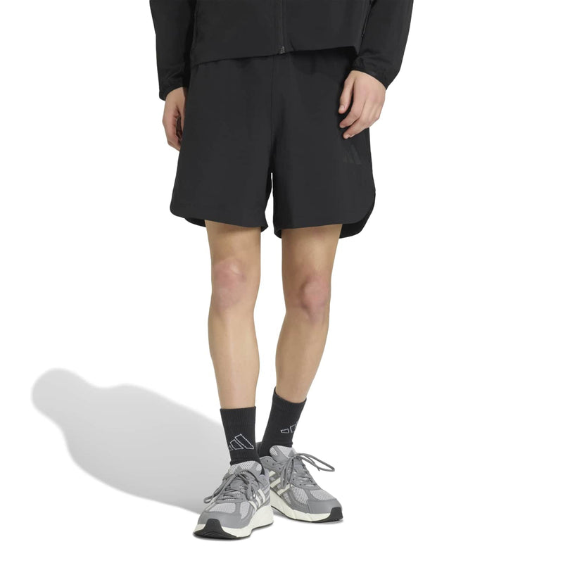 Black men's tech shorts, back view with straight hem and elastic waistband.