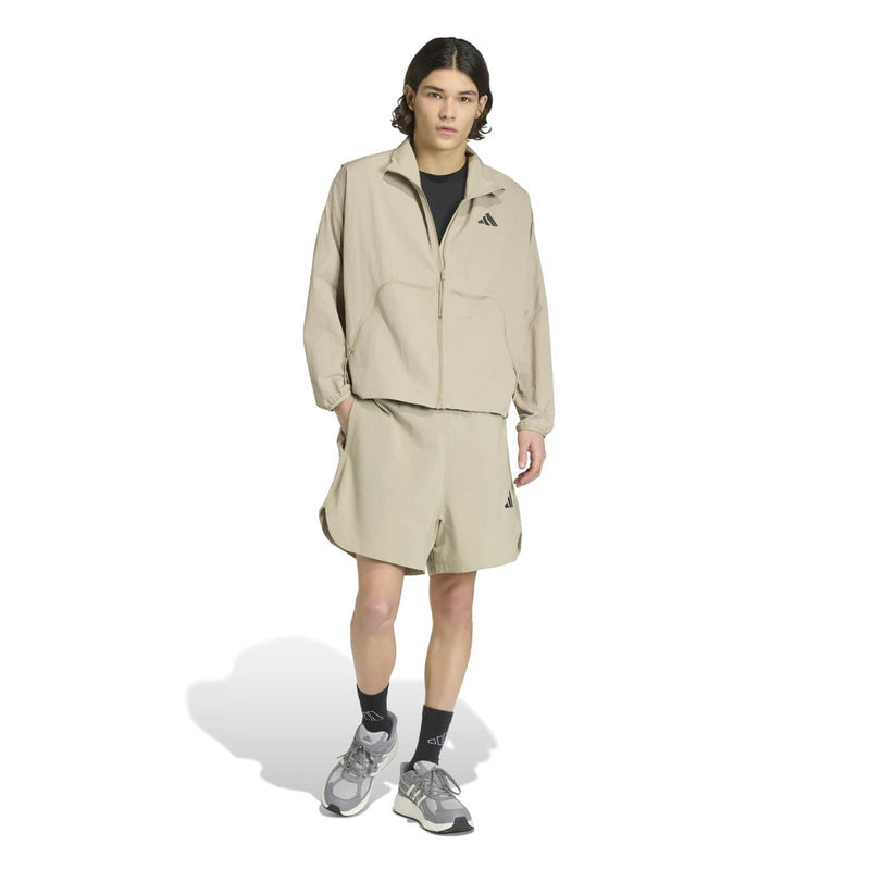 Men's khaki tech shorts with elastic waist and side logo, knee length