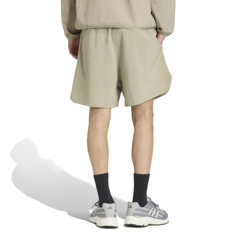 Men's khaki tech shorts with elastic waist and side logo, knee length