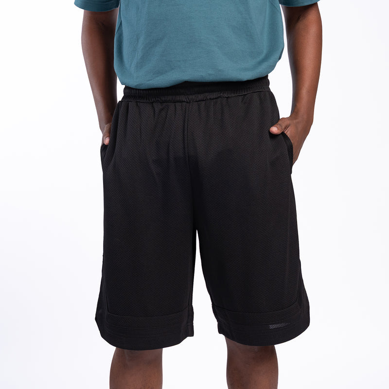 Men's black basketball shorts back view with elastic waist and stitched panels