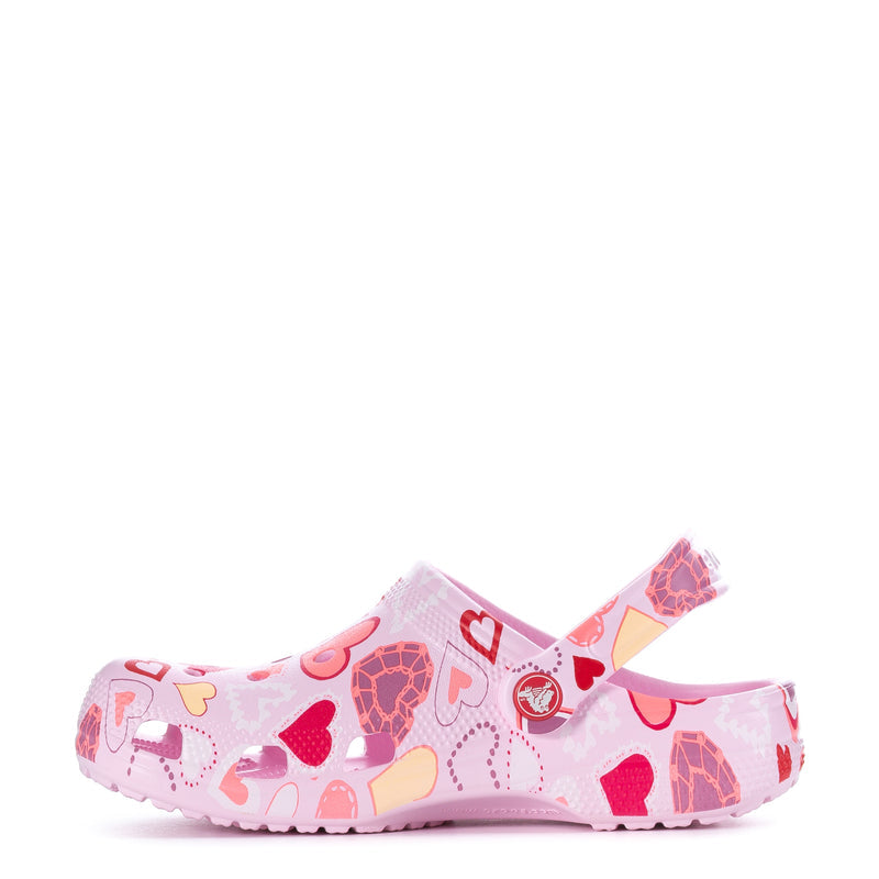 Women's pink heart-pattern clog with side emblem and adjustable heel strap