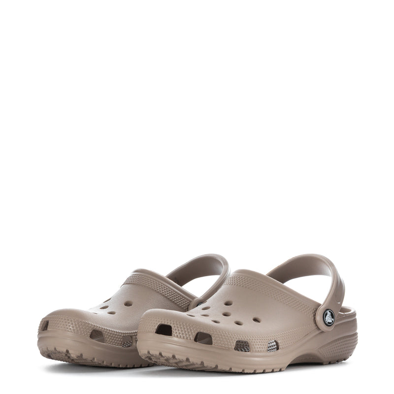 Taupe women's clogs angled view with perforated toe and logo on heel strap