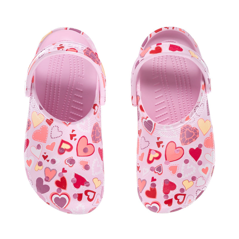 Women's pink heart-print clogs shown open toe with padded interior