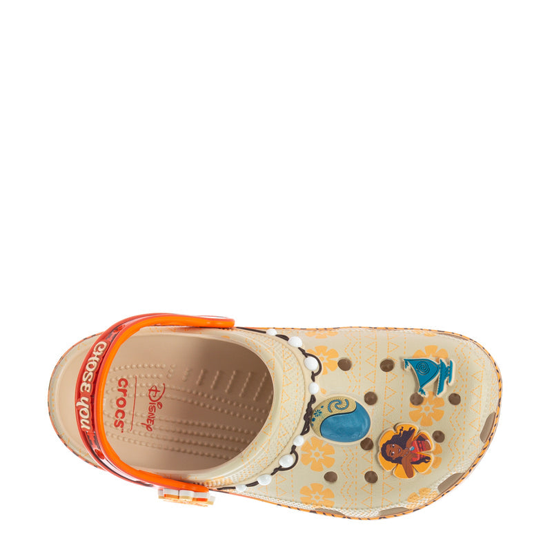 Youth clog interior view: orange strap, beige pattern with characters, padded footbed
