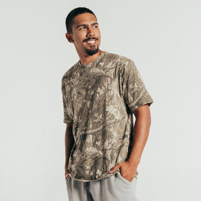 Men's tree camo crew-neck T-shirt with short sleeves, close-up of camo pattern