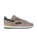 Men's suede lace-up sneakers in light gray with black side stripes and red logo accents