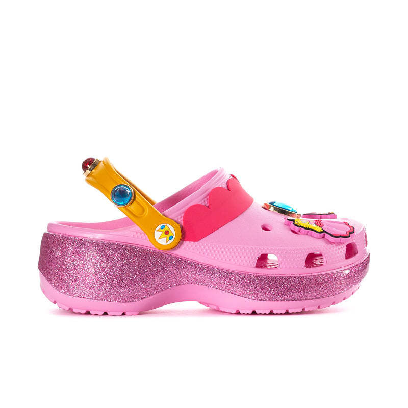 Womens pink platform clog with glitter sole, yellow strap, decorative charms