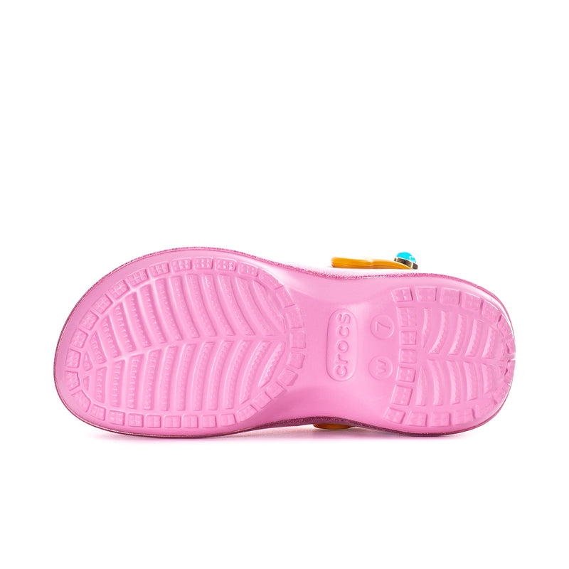 Womens pink clog outsole view, textured tread on platform base