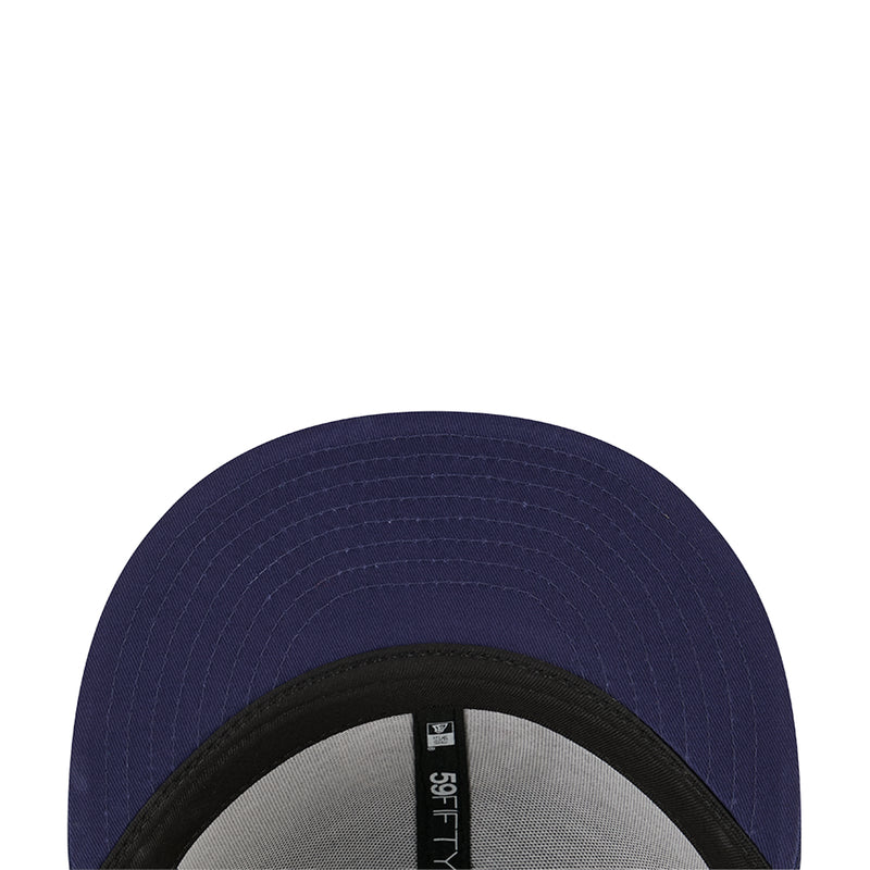 Navy snapback cap with interior brim view, adjustable strap and label