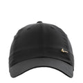 Black strapback cap with metallic gold Nike Swoosh on the front, curved brim.