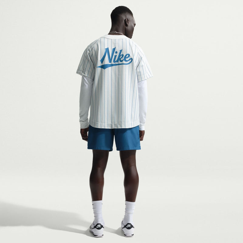 Men's blue drawstring shorts, back view with elastic waistband and Nike logo