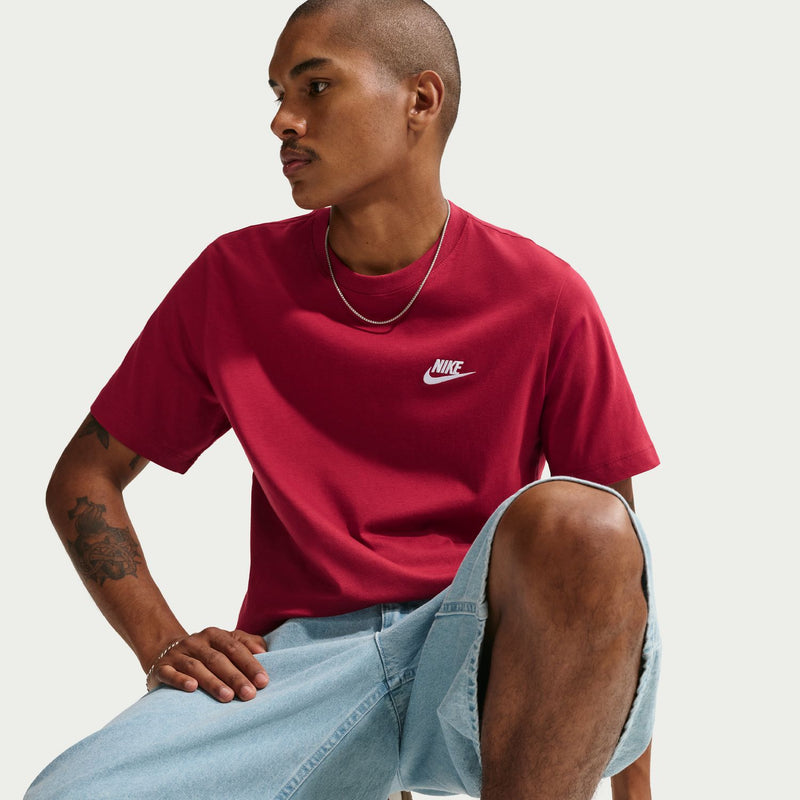 Men's deep red crew-neck T-shirt with Nike logo on the left chest, side view.