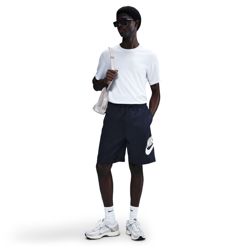 Men's dark navy woven shorts with Nike logo on side, elastic waistband and drawstring