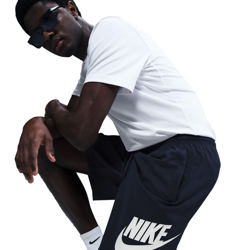 Dark navy woven shorts with Nike logo and elastic drawstring waistband