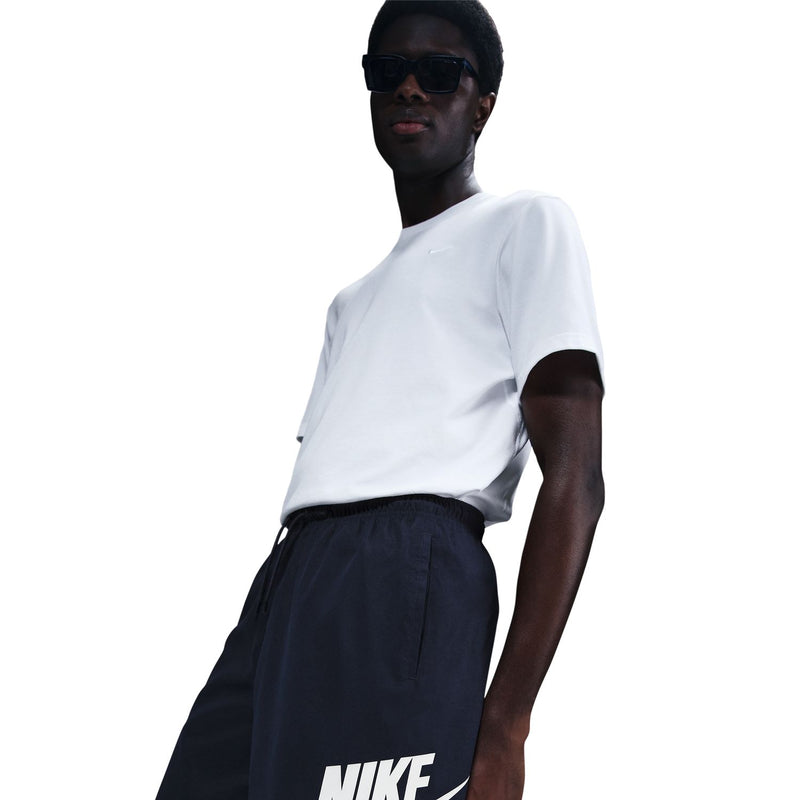Dark navy woven shorts with Nike logo on hem, elastic waistband and drawstring