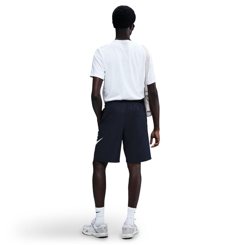 Dark navy woven shorts back view with Nike logo, elastic waistband and drawstring