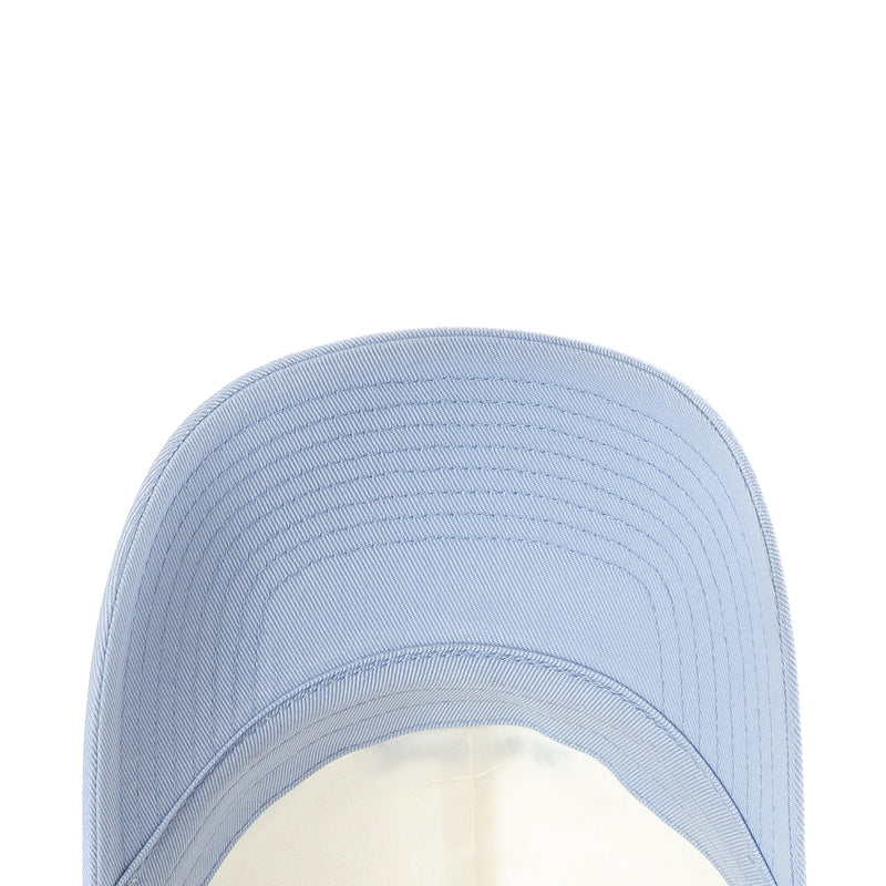 Light-blue curved bill close-up with textured stitching detail