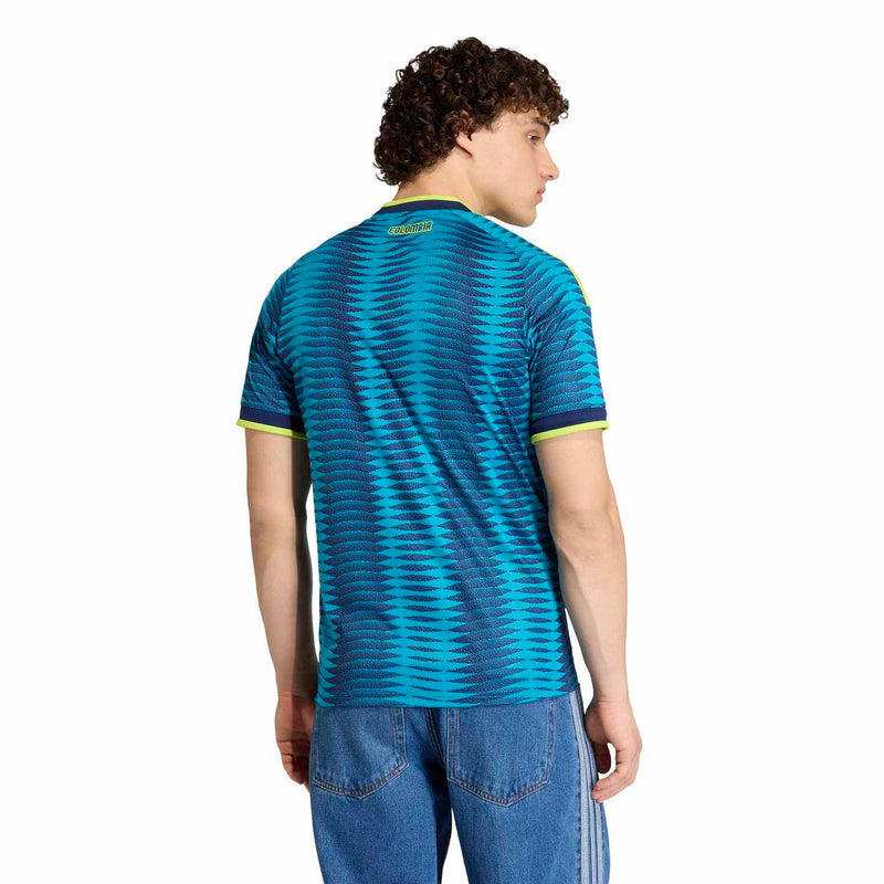 Men's Colombia away soccer jersey back view, turquoise zigzag with yellow-trim sleeves