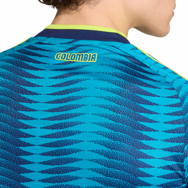 Men's Colombia away jersey back close-up with 'Colombia' text and yellow collar trim