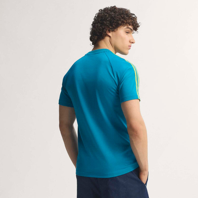 Teal soccer T-shirt for men with yellow side sleeve stripes, back view