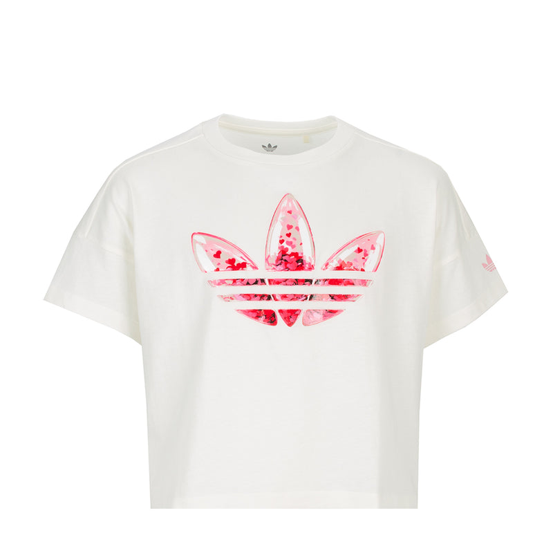 Youth off-white tee with pink confetti trefoil graphic centered on chest