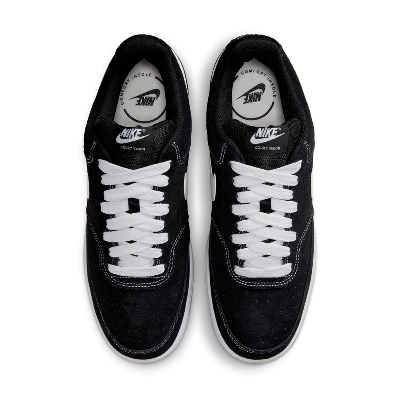 Black low-top sneakers with white laces and NIKE logos on the tongues