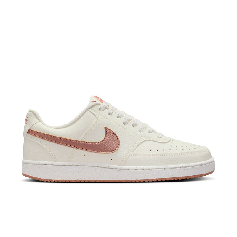 Women's low-top sneaker in sail with rose-gold pink Nike Swoosh and tan outsole