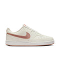 Women's low-top sneaker in sail with rose-gold pink Nike Swoosh and tan outsole