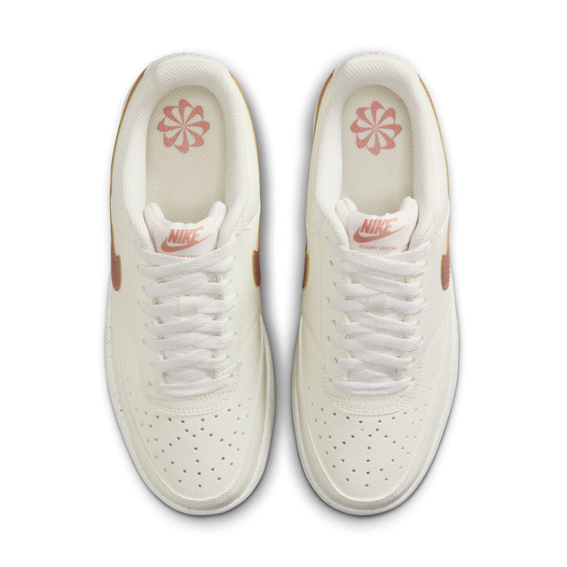 Women's sail sneaker tongues showing red flower emblem and Nike logo