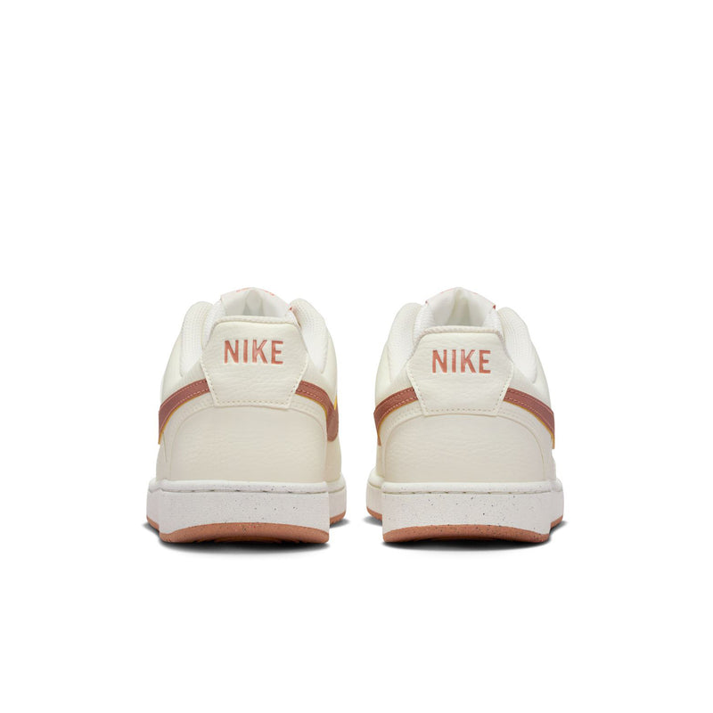 Women's sail low-top sneakers from heel view with NIKE branding and rose-gold trim