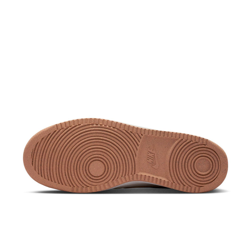 Sail sneaker outsole with circular traction pattern and embossed logo