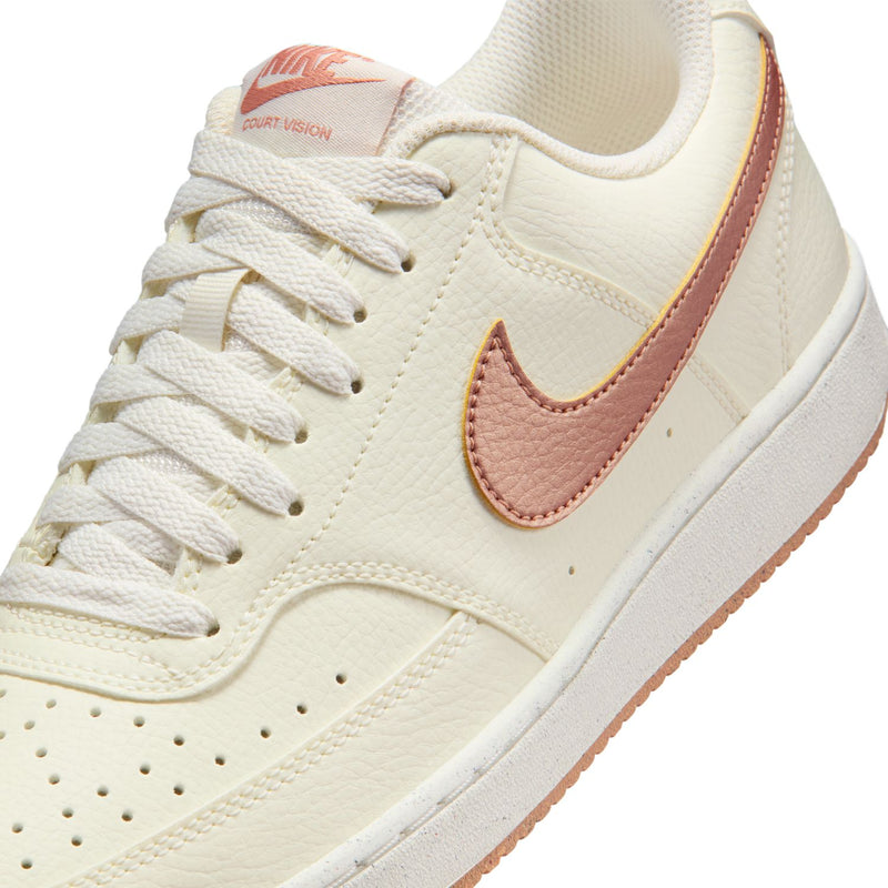 Close-up of women's sail sneaker upper with rose-gold pink Swoosh and laces