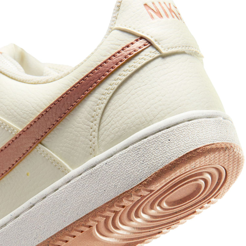 Close-up of women's sail sneaker side and midsole with textured traction outsole