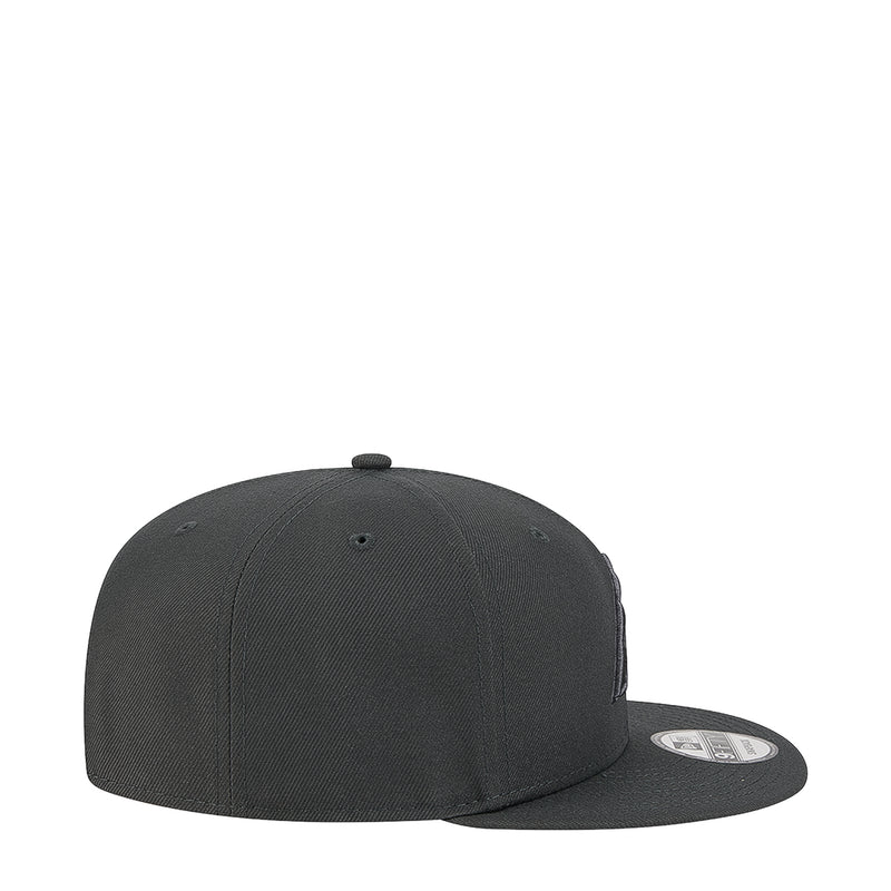 Dark gray baseball cap with curved brim, side profile
