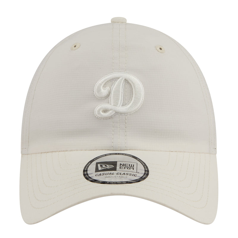 Light cream ripstop strapback cap with embroidered D logo on front