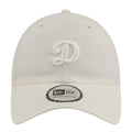 Light cream ripstop strapback cap with embroidered D logo on front
