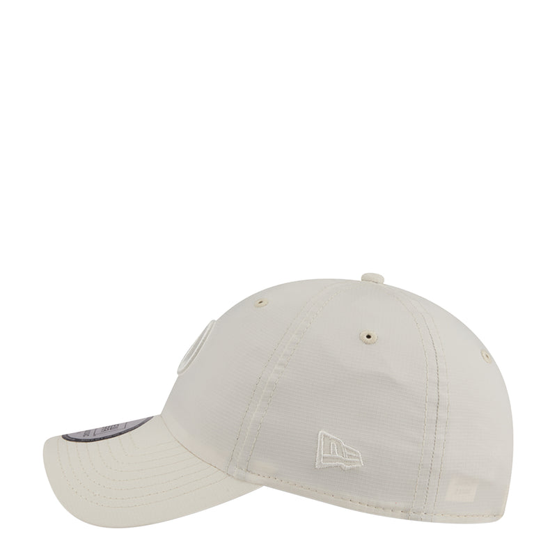 Light cream ripstop strapback cap with small embroidered D on side