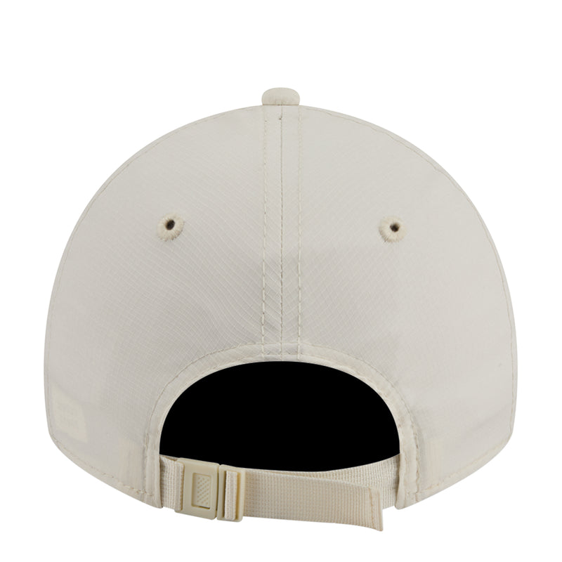 Light cream ripstop strapback cap back view with black inner lining and fabric strap