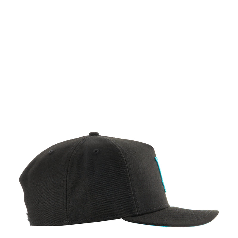 Black A-frame baseball cap side profile with turquoise accent on the crown