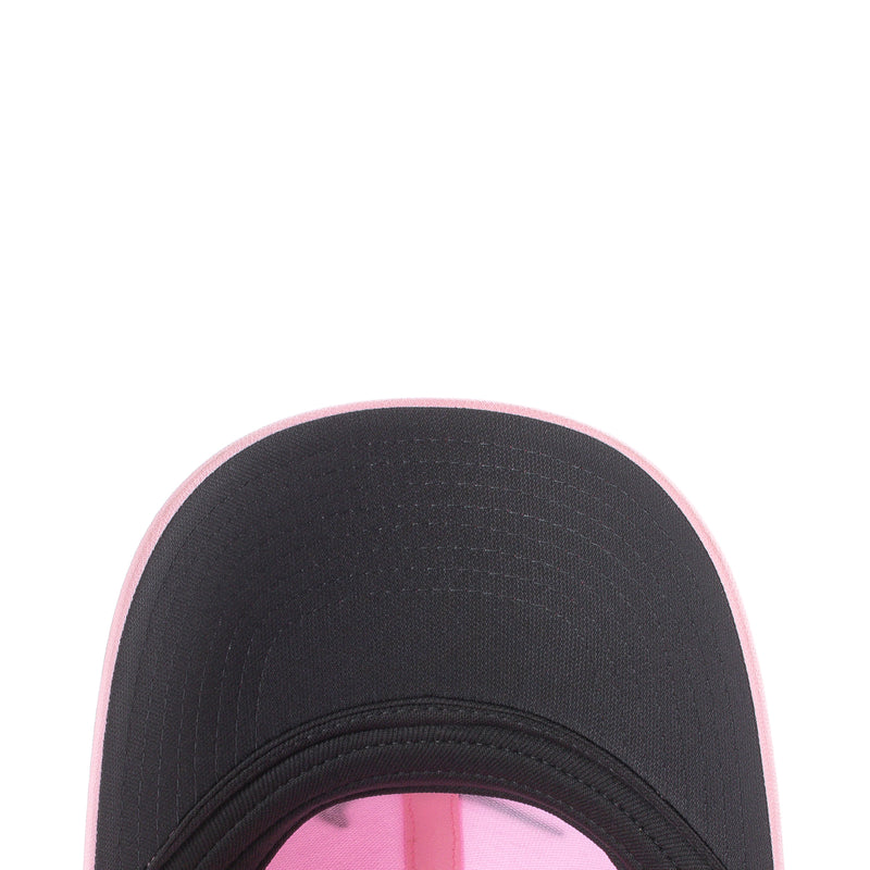Dark performance cap with pink trim and stitched back panel, athletic strapback style