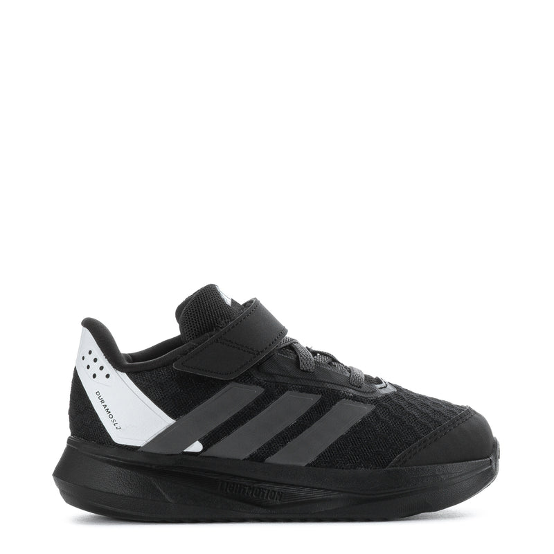 Kids black low-top sneaker with hook-and-loop strap, white side stripes, cushioned sole