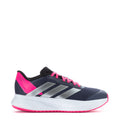 Navy youth running shoe with pink laces and silver side stripes.