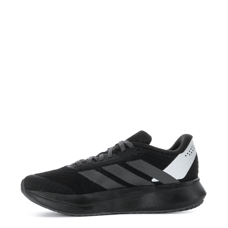 Youth running shoe side view, black upper with white and gray stripes and lace-up