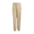 Warm sandstone women’s loose pants with elastic cuffs and white 3-stripe side detail
