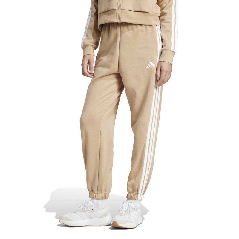 Women’s warm sandstone loose pants with white side stripes and cuffed ankle hems