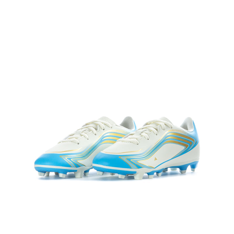 Youth soccer cleats in ivory and blue, side view with blue-striped upper
