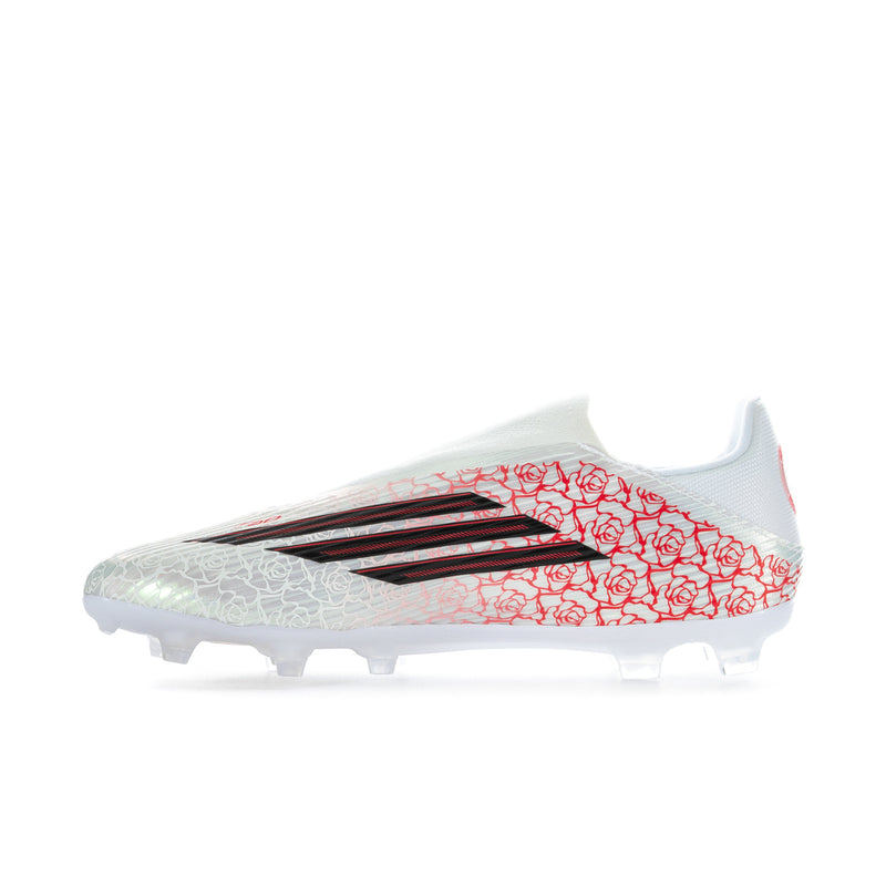 Men's white football cleats with red rose print upper and black stripe overlays
